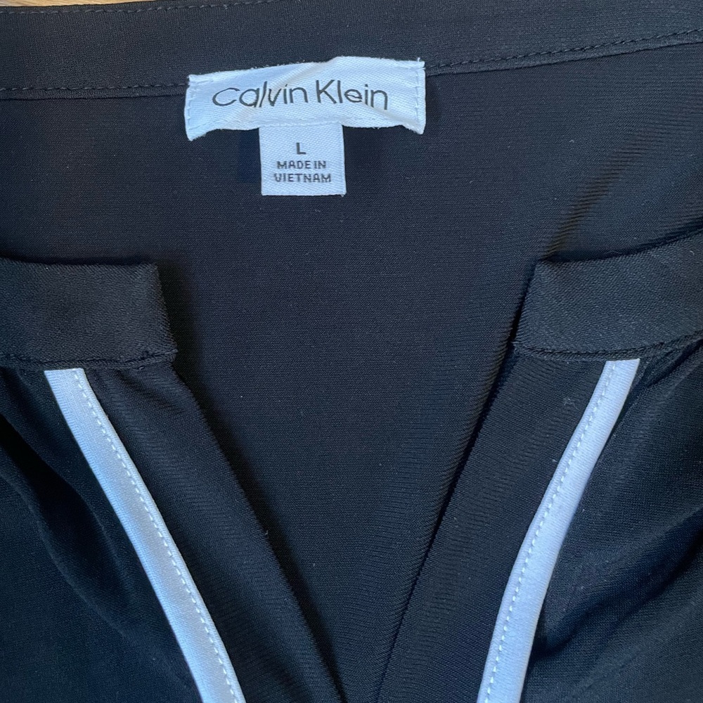 Calvin Klein Black Garment with White Accents